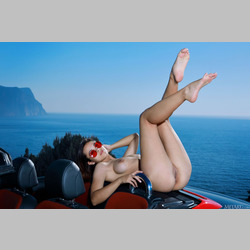 Brunette-Olivia-Cassi-Sunglasses-on-Car-from-MetArt-5.jpg
